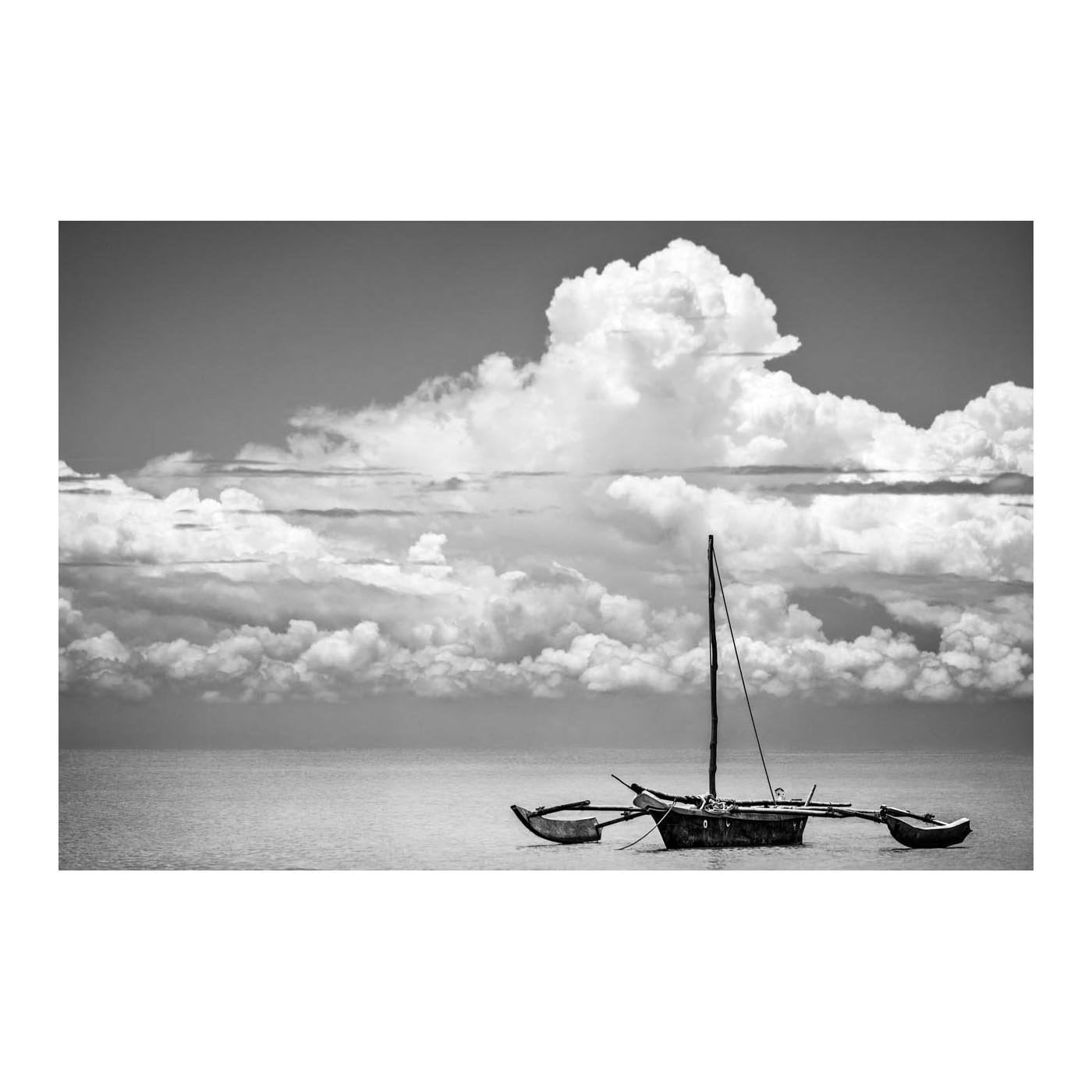 ZAN_05 BY DAVID BALLAM PHOTOGRAPHY. Outrigger II, Bububu, Zanzibar of Asante Sana Collection. A typical view of traditional outrigger boats, or Ngwalas, used by the Swahili people on the island of Zanzibar. 